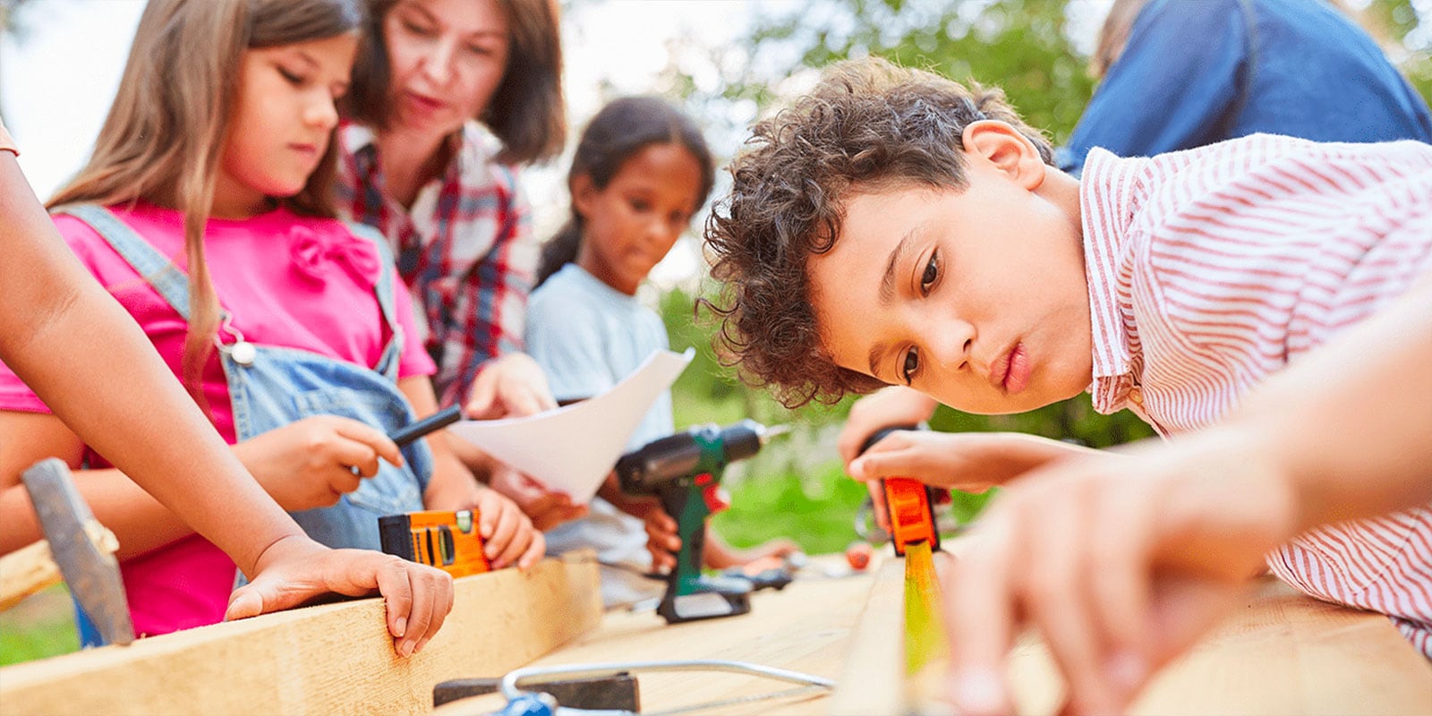 A child concentrating on an object
